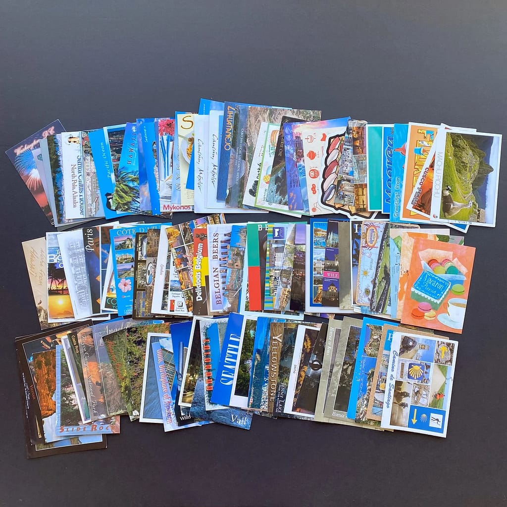 a large collection of travel postcards